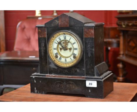 A Victorian Ashford slate and red marble architectural mantel clock, white dial, Roman numerals, Ansonia clock Co movement