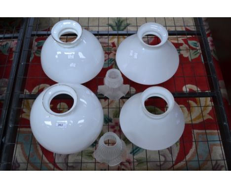 An opaline glass lamp shade; three other opaline shades; two tulip glass shades (6)