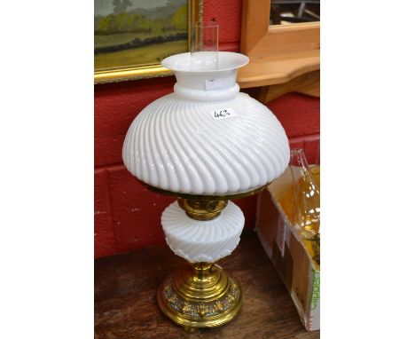 Lighting - a Victorian Veritas Lampworks London wall mounting oil lamp, ornate solid reservoir, cast iron bracket;  another; 