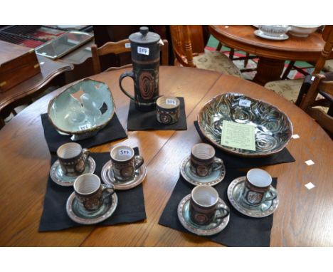 A Briglin Studio Pottery coffee set for six, comprising coffee pot, six cups and saucers, and sugar bowl, decorated with spir