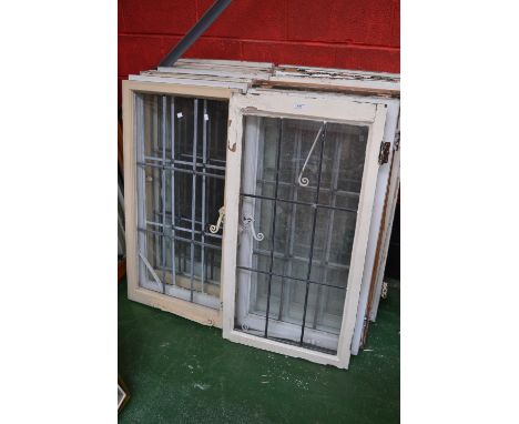 Architectural Salvage - sixteen casement windows, leaded lights including some window furniture, 109cm x 57cm approx., 1940