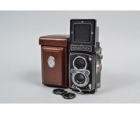 A Rolleiflex 3.5 MX K4A TLR Camera, serial no 1417127, body G, Synchro-Compur shutter working, self-timer working, some depos