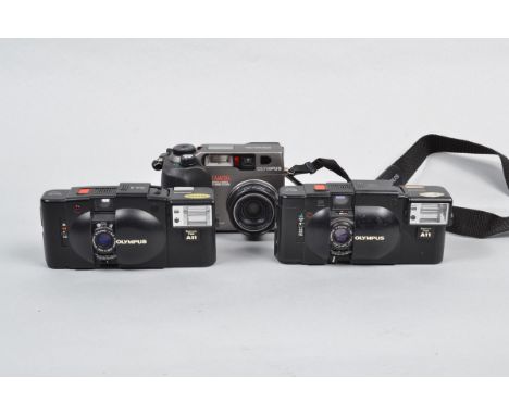 Olympus Compact Cameras, an Olympux XA, powers up, shutter sometimes won't fire, timer works, body F, with A11 flash, unteste