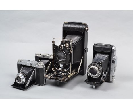 A Tray of Folding Cameras, including a Pentacon Ercona II, shutter working, body G, with Carl Zeiss Jena 105mm f/3.5 Tessar l