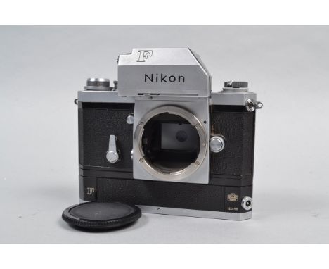 A Nikon F Photomic Camera Body, chrome, serial no 6567171, with photomic T finder, with F36 motor drive, serial no 122099, sh