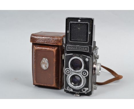 A Rolleiflex 3.5 MX-EVS K4B TLR Camera, serial no 1476496, button in aperture wheel disengages EV coupling, body F-G, shutter