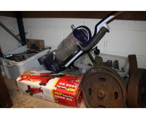 A HYDRAULIC JACK, TOOLS, CAST WHEELS,  WEIGHTS ETC