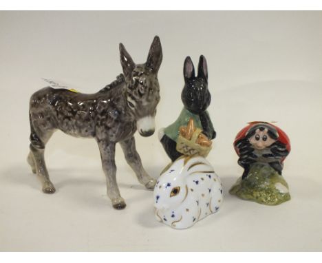 A GOEBEL DONKEY FIGURE, ROYAL CROWN DERBY RABBIT PAPERWEIGHT AND TWO ROYAL ALBERT BEATRIX POTTER FIGURES (4) 