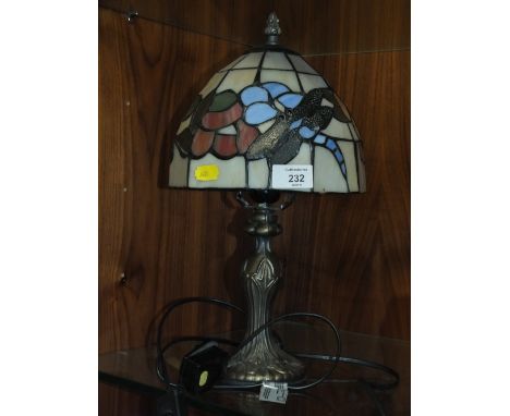 A SMALL TIFFANY STYLE LAMP