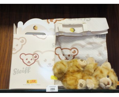 A STEIFF GINGER CAT SOFT TOY WITH ORIGINAL BOX AND BAG