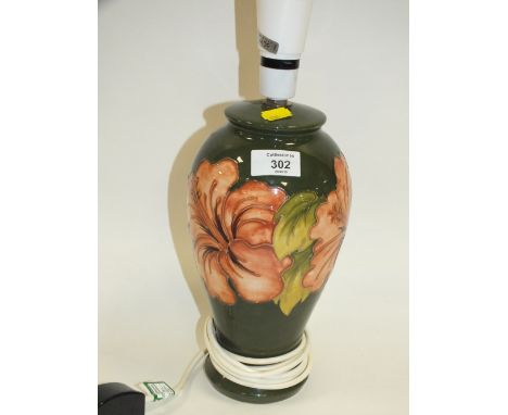 A LARGE MOORCROFT HIBISCUS PATTERN TABLE LAMP