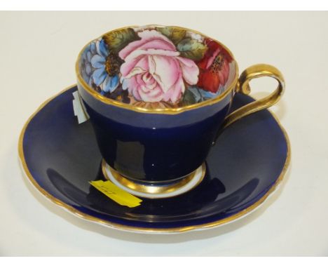 A VINTAGE AYNSLEY CUP AND SAUCER WITH CABBAGE ROSE INTERIOR SIGNED J A BAILEY  