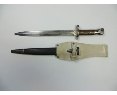 1888 Pattern MKII Metford Bayonet  12 inch double edged blade. The forte marked “Wilkinson London” dated “8/99”. Steel muzzle