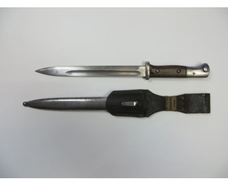 WW1 Dated K98 Bayonet and Frog  9 3/4 inch single edged blade. Large fuller. The forte marked “Gottlier Hammesfahr Solingen F