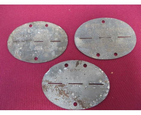 Three German ID Tags Including SS  consisting alloy one piece splittable ID tag stamped Waffen SS. 2/Gren Rgt 81 (Ital) 144 .