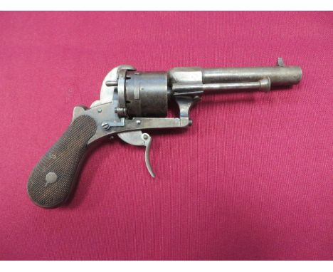Late 19th Century English Pinfire Revolver  7mm 3 1/2 inch rifled barrel with octagonal back section and side mounted clearin
