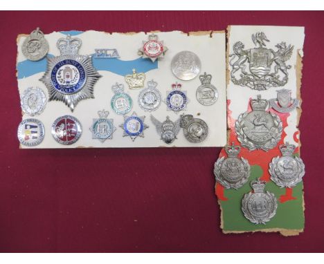 Selection of Various Police Helmet Plates and Cap Badges  helmet plates include QC chrome Glamorgan ... QC chrome Monmouth ..