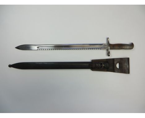 Swiss M1914 Pioneer Sawback Bayonet  19 inch single edged blade with long fuller to one side. Rear sawback edge. Forte marked