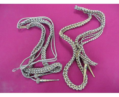 Two Sets of Royal Navy Aiguillettes  gilt and blue twisted cord straps with lower gilt acorns with applied silvered anchors. 