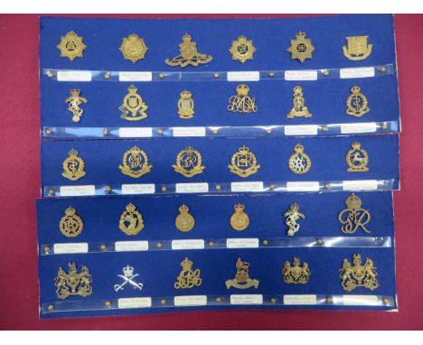 Selection of Corps Cap Badges  including KC brass APC ... KC brass Military Police ... Brass Army Ordnance Corps ... KC brass