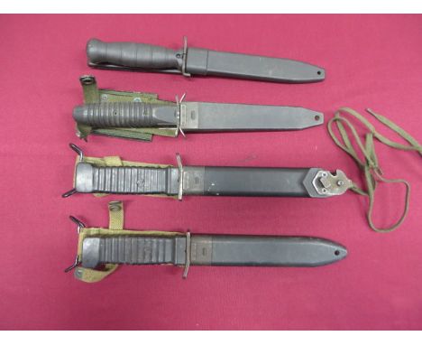 Four Post WW2 German Contract Combat Knives  single edged blade with sharpened back edge point. Steel turn up crossguard. Bla