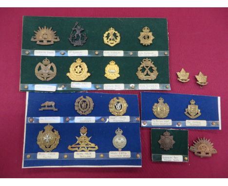 Selection of Commonwealth Forces Badges  including KC bronzed Australian Army Medical Corps ... Blackened 13th Australia Ligh