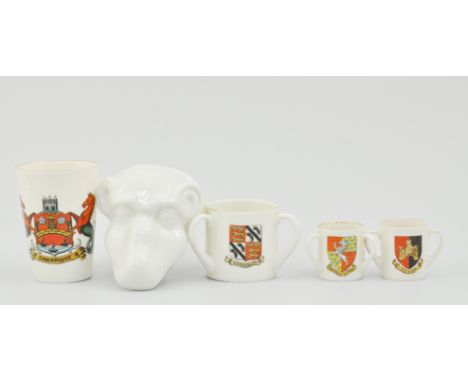 Various W.H. Goss and Crested ware including, a Cambridge crested beaker, the nose of Braysnoze, Oxford and other various cre