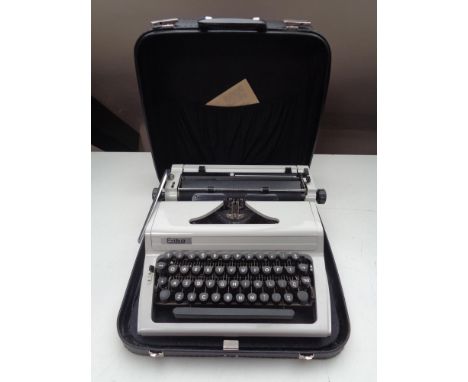 A cased IKA typewriter 