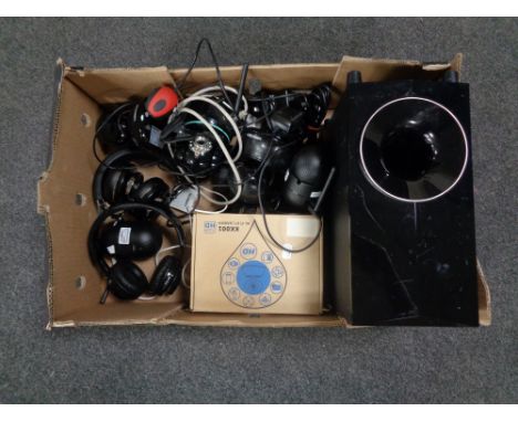 A box containing Wifi cameras, headphones, Blaupunkt speaker etc.  