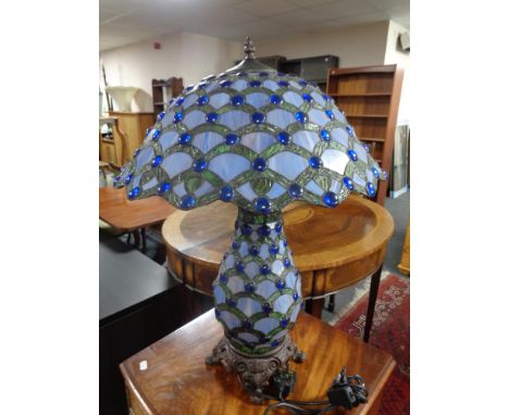 A Tiffany style leaded glass table lamp with matching shade 