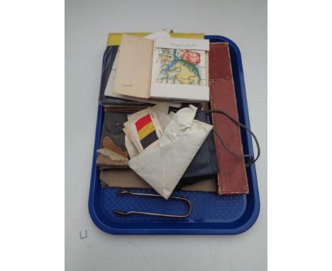 A tray of 1920's sketch book, vintage birthday cards, silks and cigarette cards, cased slide rule etc 