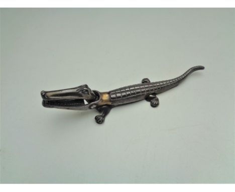 An early twentieth century cast metal crocodile nut cracker 