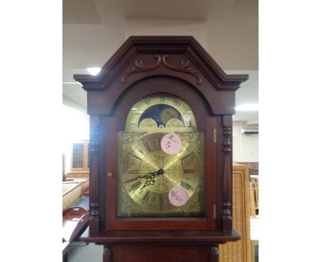 A Royal longcase clock with moonphase brass dial, pendulum and weights 