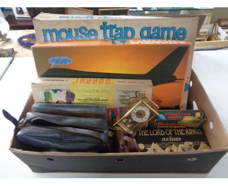 A box of vintage board games, Mouse Trap, Lord of the Rings box set, carriage clock etc  