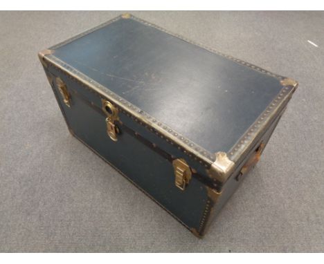 A twentieth century metal bound shipping trunk 