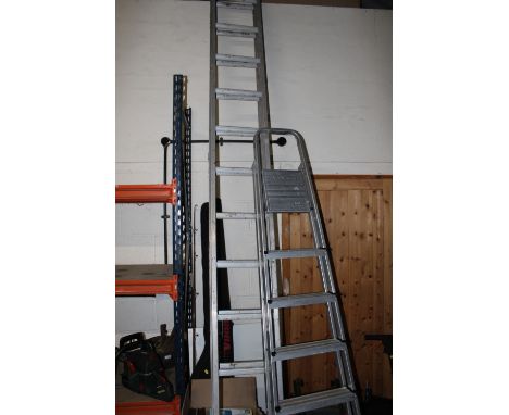 A LARGE SET OF LADDERS TOGETHER WITH A LARGE SET OF STEP LADDERS