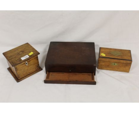 AN OAK TWO SECTION TEA CADDY TOGETHER WITH A SIMILAR SINGLE SECTION TEA CADDY AND A MAHOGANY BOX (3)