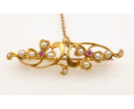 Seed pearl and ruby foliate bar brooch stamped 18 approx 4.8gm gross   Condition Report   Click here for further images, cond