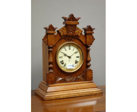 19th century oak architectural cased 'Ansonia Tivoli' mantel clock, 8-day movement with enamel dial, H38cm   Condition Report