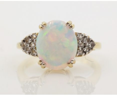 9ct gold opal and white spinel ring hallmarked   Condition Report   Click here for further images, condition, auction times &