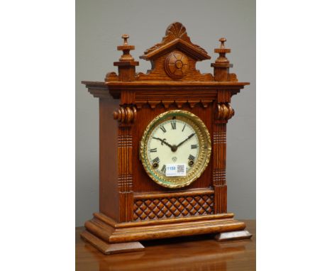 19th century oak architectural cased 'Ansonia Salem' mantel clock, 8-day movement with enamel dial, H38cm   Condition Report 