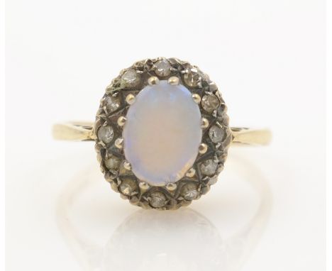 Opal and diamond gold cluster ring hallmarked 9ct    Condition Report   Click here for further images, condition, auction tim