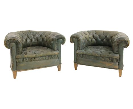 A pair of Victorian green leather button upholstered club armchairs,each with rollover back, and on square tapering legs,99cm