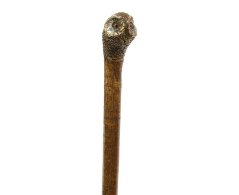 A Swaine &amp; Adeney owl walking stick,hazel, the handle carved and painted with the head of an owl, with glass eyes, stampe