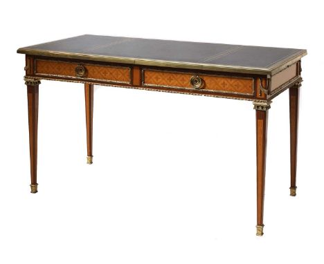 A French Louis XVI-style mahogany, satinwood and gilt-metal mounted bureau plat,late 20th century, the gilt tooled leather to
