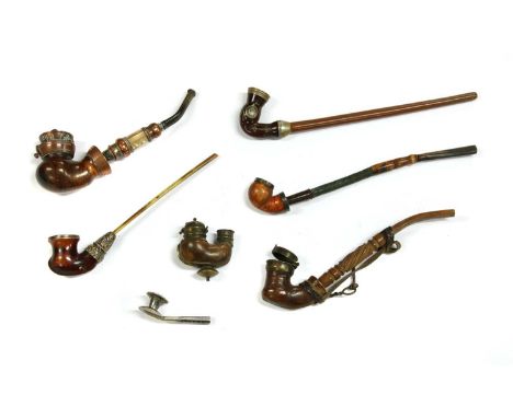 Five Kyrgyz inlaid wood pipes,19th century, Circassia, each with silver or copper mounts, one with a mother-of-pearl mounted 