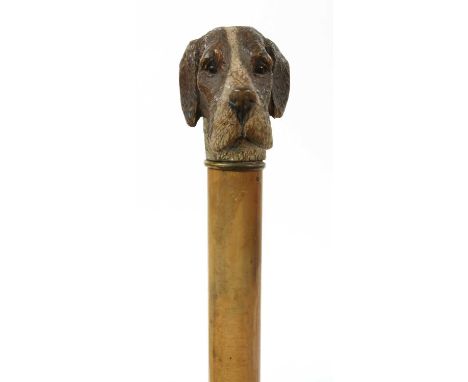 A walking stick with hound's head handle, in the manner of Swaine &amp; Adeney, the handle carved and painted with the head o