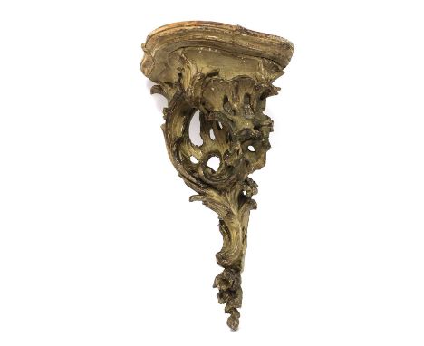 A rococo corner wall bracket,18th century, French, carved and painted,50.5cm high27cm deepCondition report: Paint rubbed and 