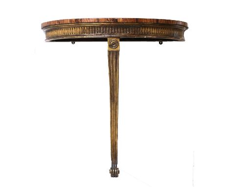 A satinwood, rosewood crossbanded and inlaid demi-lune console table,c.1800, with a fluted frieze above a single scrolling su