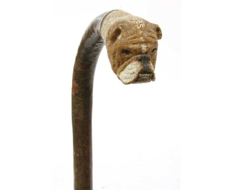 A Brigg boxer's head walking stick,hazel, the handle carved and painted with the head of a boxer, with glass eyes, stamped 'B